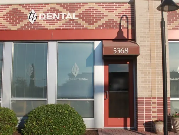 The Twin Hickory Dental entrance under the 5368 awning, with the th DENTAL sign above.